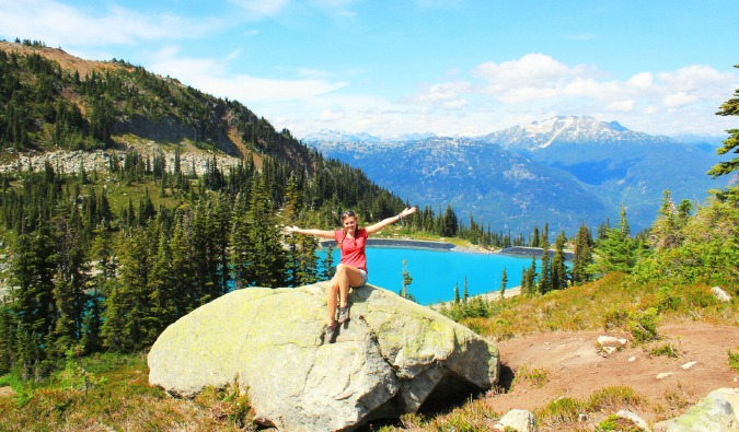 Backpacking around Canada and visiting the lush landscape and lake in Whistler