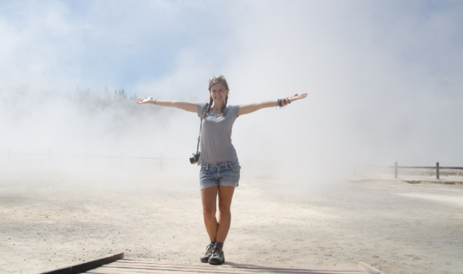 Solo girl traveler in a sand storm in New Zealand