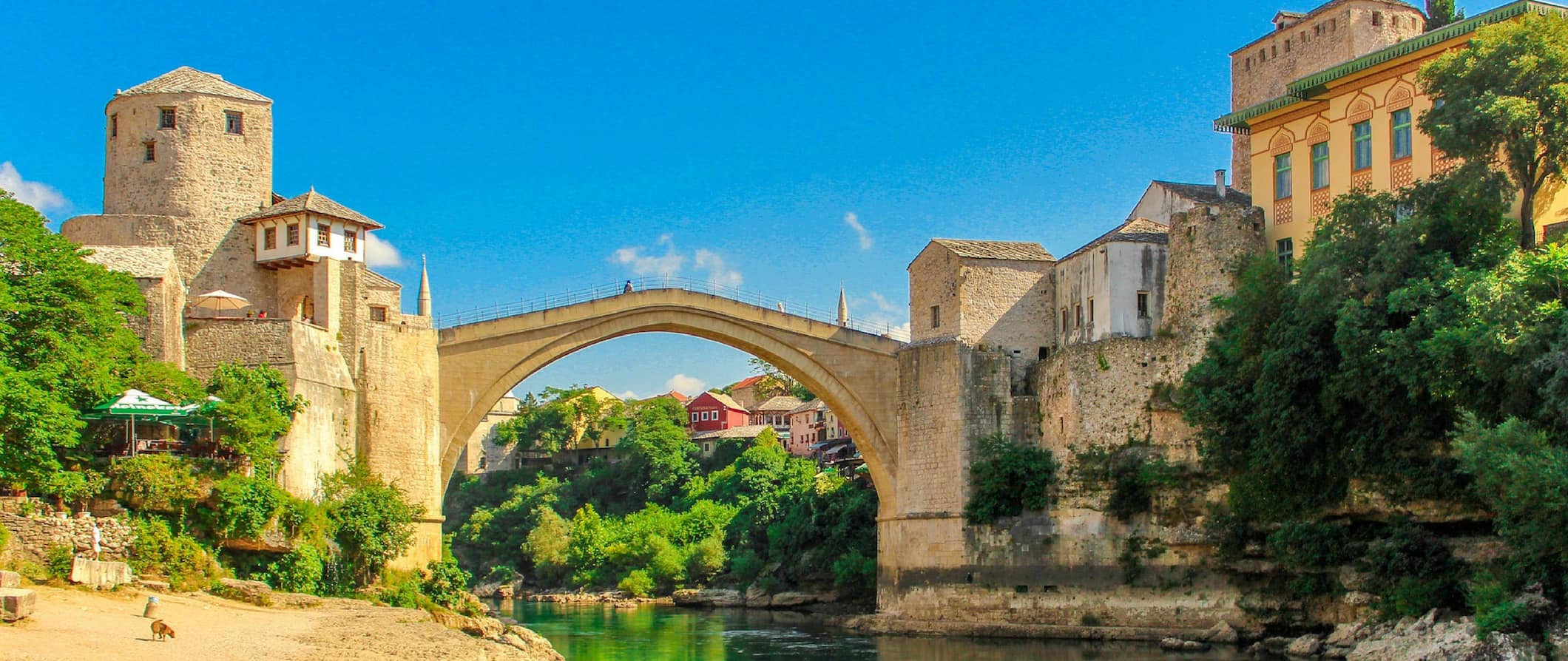 a view of a bridge across water in Bosnia & Herzegovina
