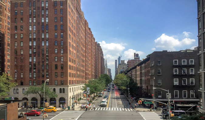 Street view of Chelesa, NYC with an empty street on a summer day
