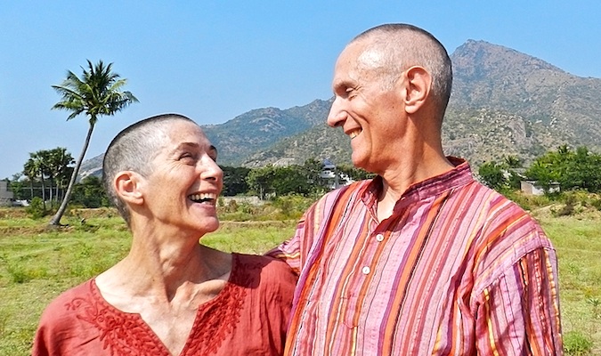 Don and Alison, a happy senior couple traveling the world