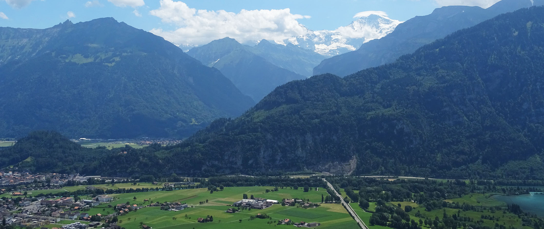 A rolling green mountainous landscape in Interlaken, Switzerland