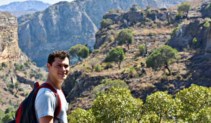 Nomadic Matt hiking in the mountains of Madagascar