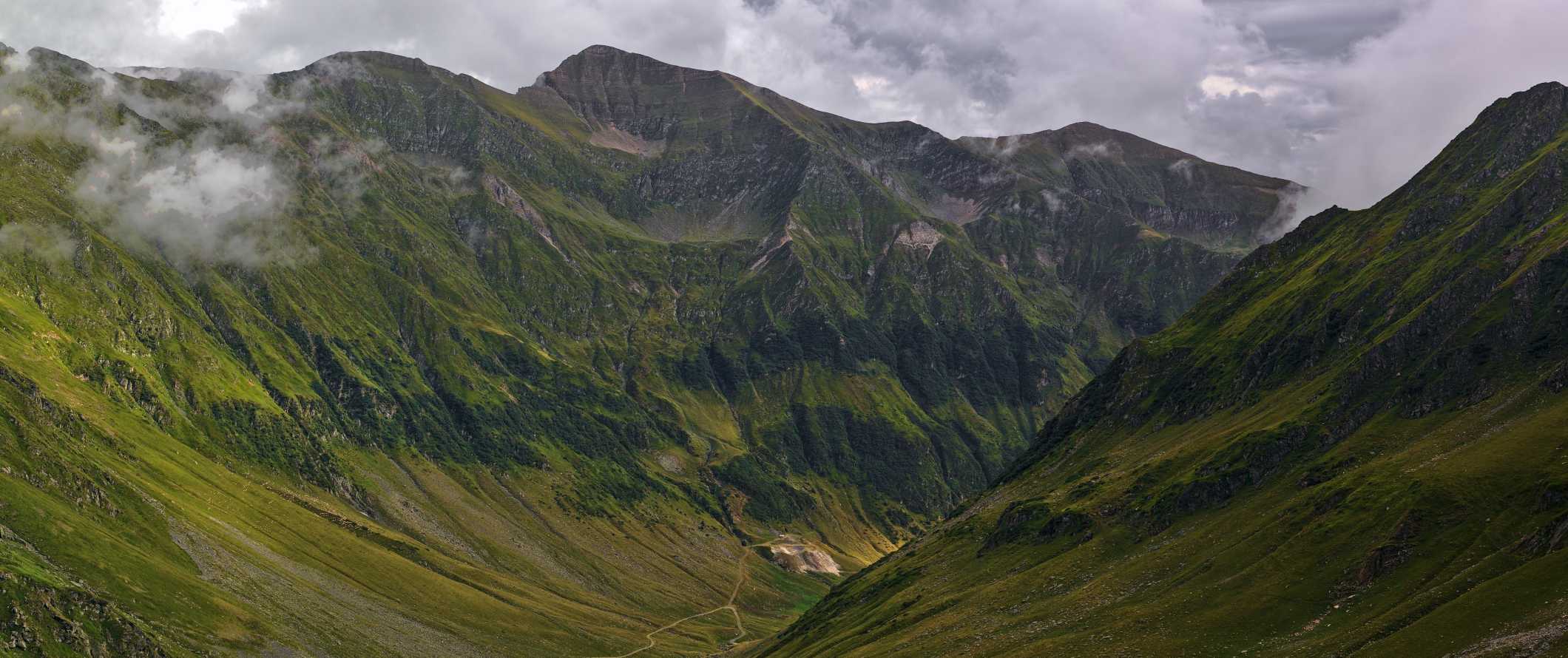 The dramatic green peaks of the Faragas Mountains in Romania.