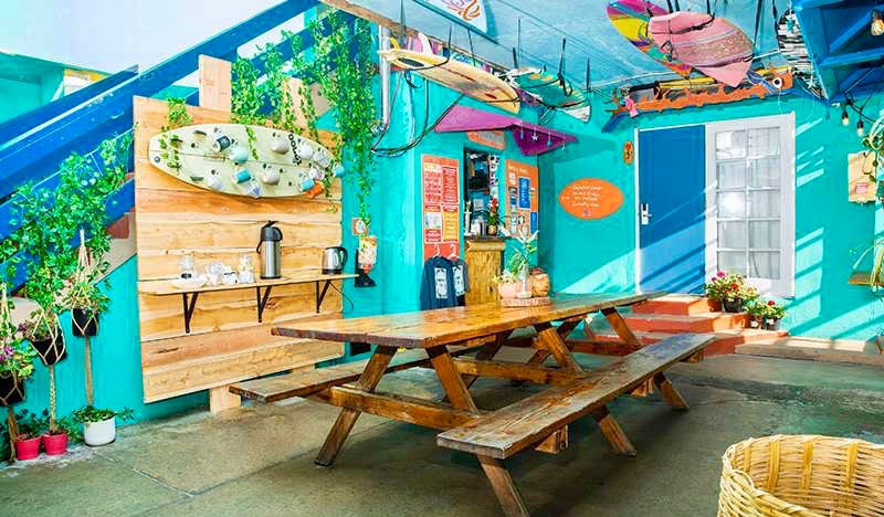The common area of the ITH Surf Hostel in San Diego, California