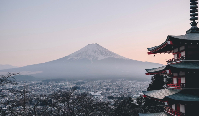 The view overlooking Mount Fuji in Japan with a temple in the foreground