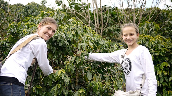 Shannon O'Donnell volunteer farming with her young niece overseas