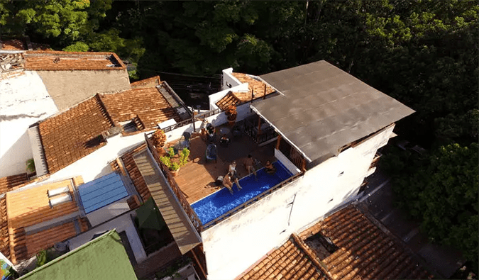 Bird's eye view of rooftop terrace with pool at Casa Kiwi Hostel, Medellin